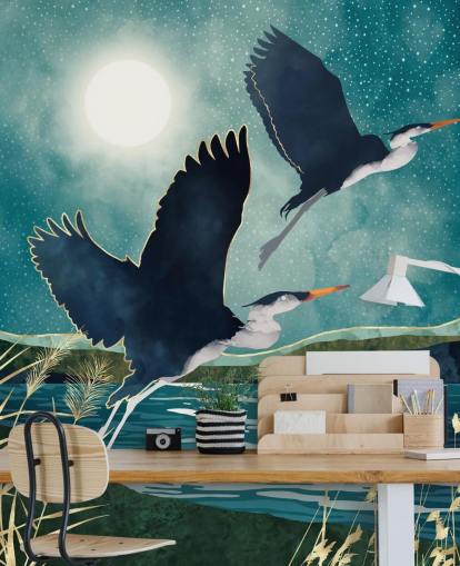 Navy herons flying over a blue river with a turquiose sky