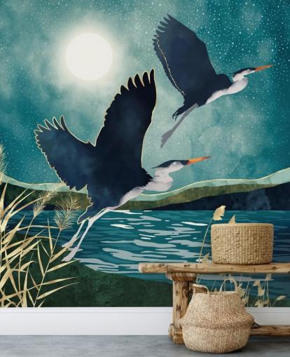 Navy herons flying over a blue river with a turquiose sky