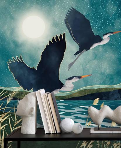 Navy herons flying over a blue river with a turquiose sky