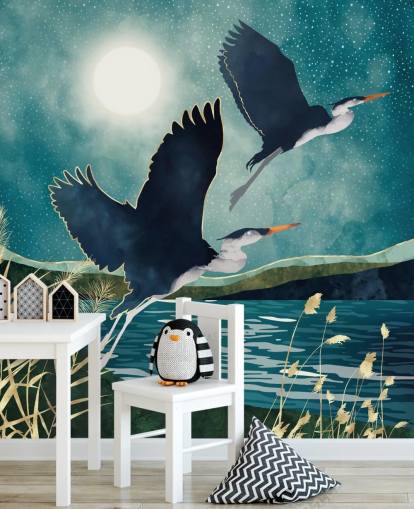 Navy herons flying over a blue river with a turquiose sky