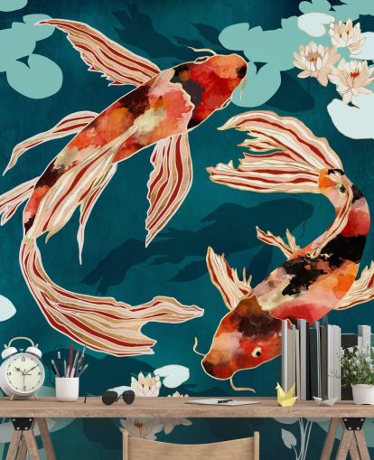 Orange koi swimming in a blue pond with turquoise lily pads