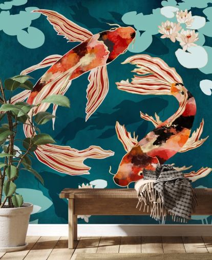 Orange koi swimming in a blue pond with turquoise lily pads