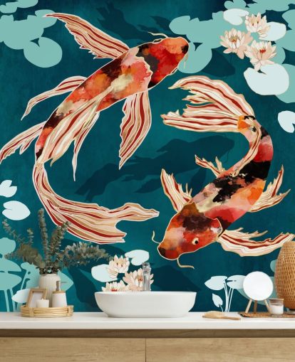 Orange koi swimming in a blue pond with turquoise lily pads