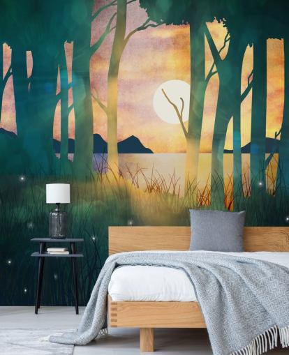 Emerald green forest with a setting sun over a river and blue mountains Emerald green forest with a setting sun over a river and blue mountains