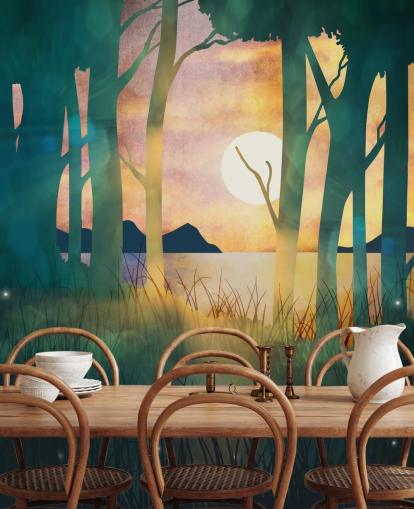 Emerald green forest with a setting sun over a river and blue mountains wallpaper