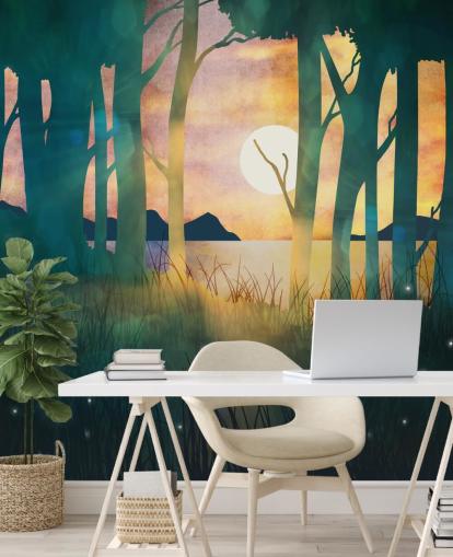 Emerald green forest with a setting sun over a river and blue mountains