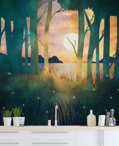 Emerald green forest with a setting sun over a river and blue mountains Emerald green forest with a setting sun over a river and blue mountains