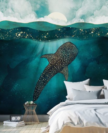 Océano azul oscuro con un tiburón ballena dorado y siluetas azules distantes Océano azul oscuro con un tiburón ballena dorado y siluetas azules distantes