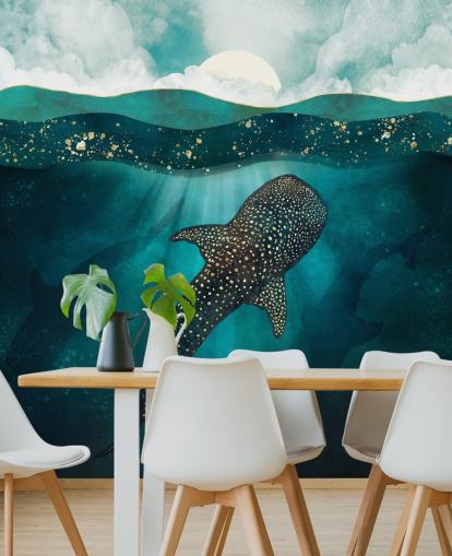 Dark blue ocean with a gold whale shark and distant blue silhouettes wallpaper