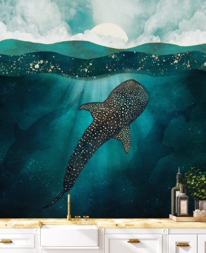 Dark blue ocean with a gold whale shark and distant blue silhouettes 