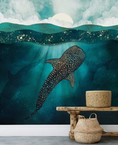 Océano azul oscuro con un tiburón ballena dorado y siluetas azules distantes 