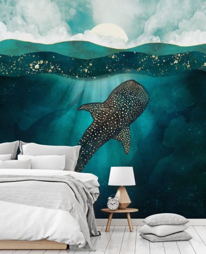 Dark blue ocean with a gold whale shark and distant blue silhouettes 