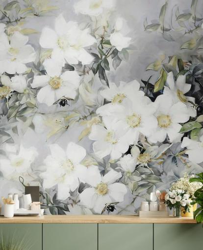 Fond gris avec des fleurs blanches et des feuilles vertes atténuées Fond gris avec des fleurs blanches et des feuilles vertes atténuées