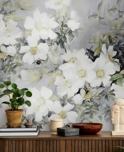 Fond gris avec des fleurs blanches et des feuilles vertes atténuées