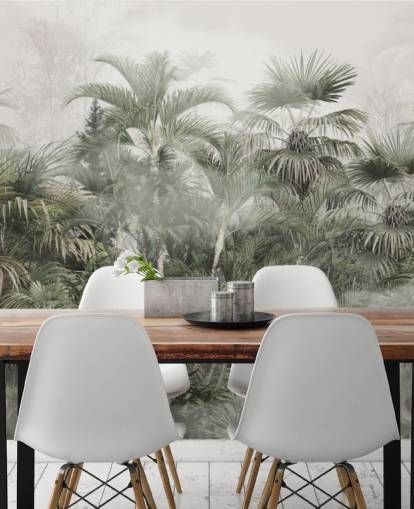 Dark green tall plam trees in a misty jungle with a light gray sky wallpaper