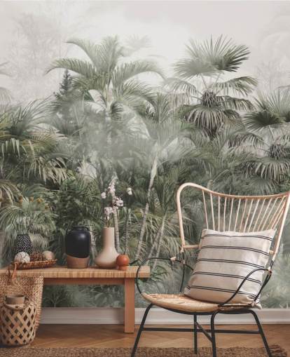 Dark green tall plam trees in a misty jungle with a light gray sky wallpaper