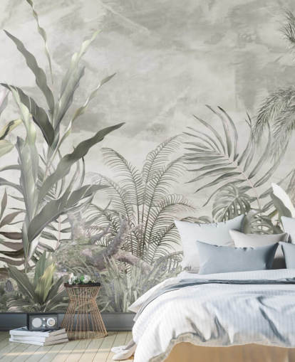 Green and grey jungle leaves and branches on a misty wallpaper