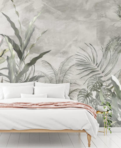 Green and grey jungle leaves and branches on a misty wallpaper