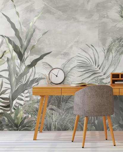 Green and gray jungle leaves and branches on a misty wallpaper