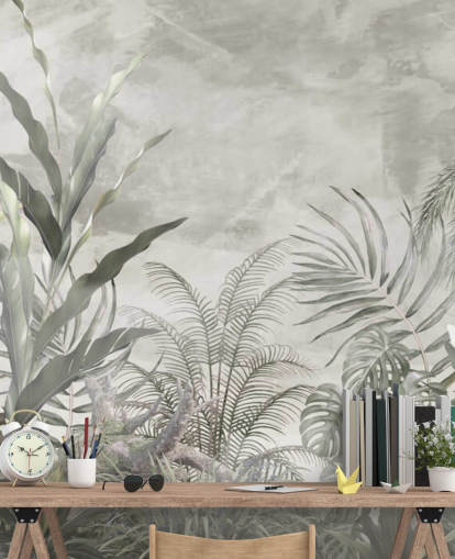 Green and grey jungle leaves and branches on a misty wallpaper