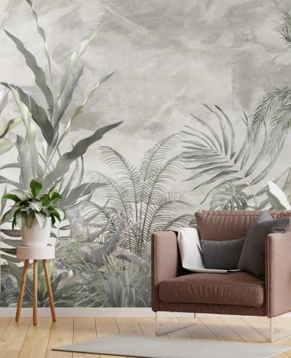 Green and grey jungle leaves and branches on a misty wallpaper