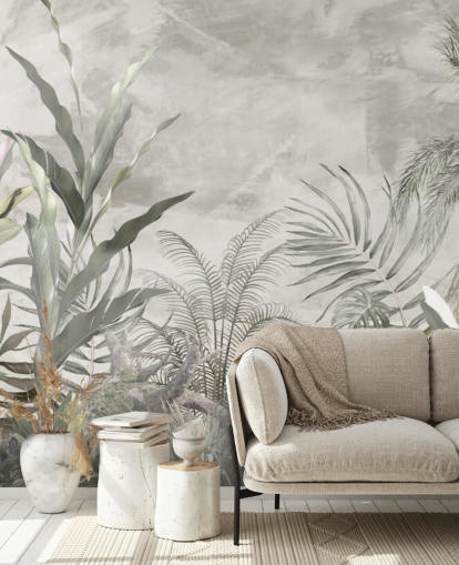 Green and grey jungle leaves and branches on a misty wallpaper