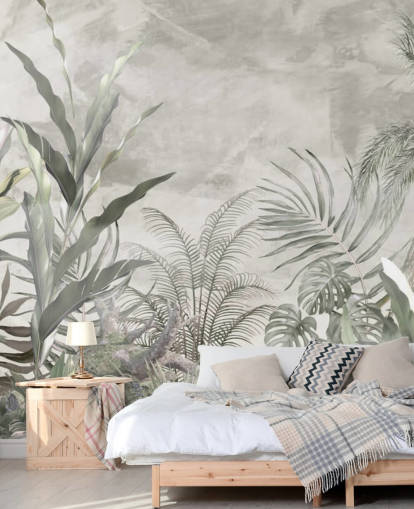 Green and grey jungle leaves and branches on a misty wallpaper