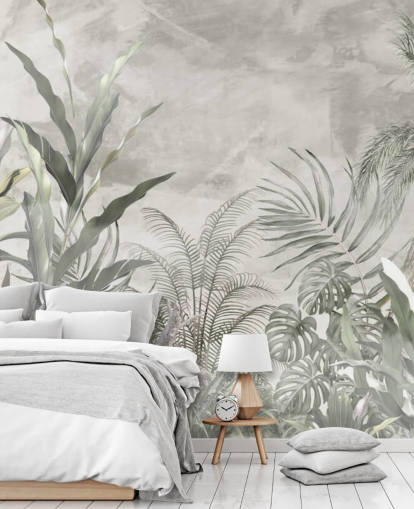 Green and grey jungle leaves and branches on a misty wallpaper