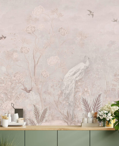 Light pink faded vintage wallpaper in a chinoiserie style with soft grownig vines and white crane birds and peacocks