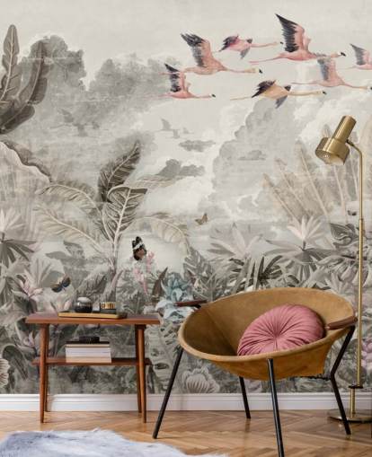 Muted green palm trees and jungle trees with light pink flowers and flying pink flamingo birds wallpaper