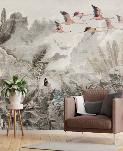 Muted green palm trees and jungle trees with light pink flowers and flying pink flamingo birds wallpaper