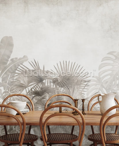 neutral beige jungle wallpaper with tropical trees and a hazy white sky