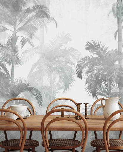 Palmiers tropicaux verts atténués avec un fond d'écran brumeux