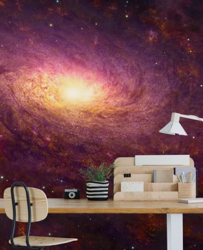 Dark purple swirling galaxy with red swirls and stars with a bright center wallpaper