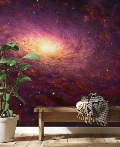 Dark purple swirling galaxy with red swirls and stars with a bright center wallpaper