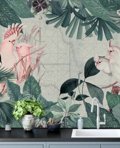 Light grey background surrounded by teal tropical leaves and white and blush pink cockatoo birds wallpaper