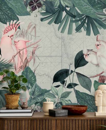 Light grey background surrounded by teal tropical leaves and white and blush pink cockatoo birds wallpaper