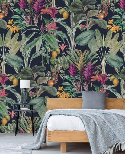 Dark blue background with muted green tropical leavesand purple tropical flowers wallpaper