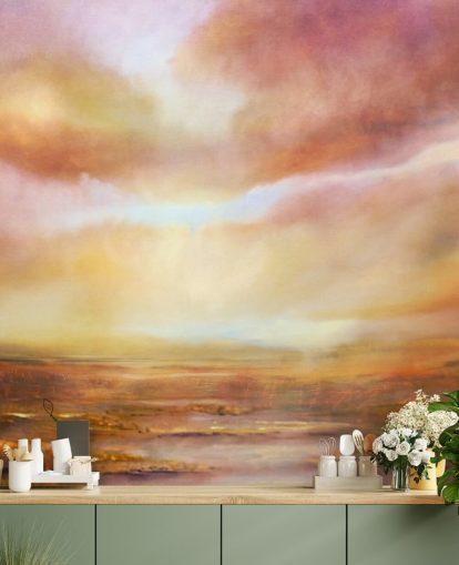 Abstract painting of a yellow and pink landsape with the sun shining through the clouds