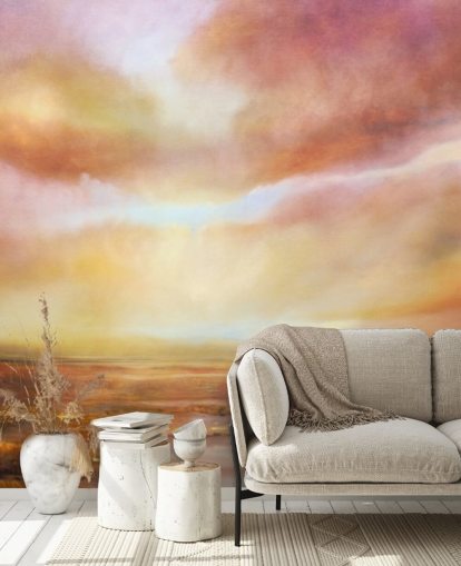 Abstrakt maleri av en gul og rosa landsape med solen skinner gjennom skyene