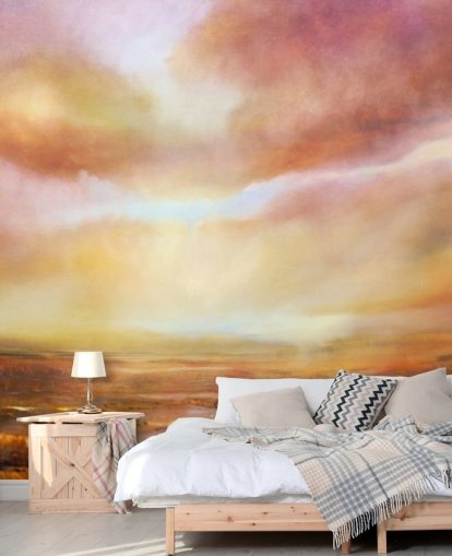 Abstract painting of a yellow and pink landsape with the sun shining through the clouds