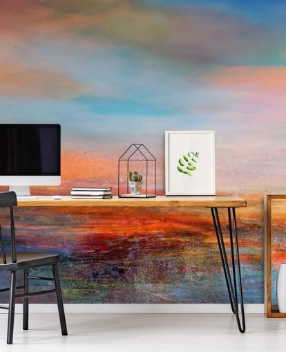 Colorful abstract painting of a sunset with reds, blues and yellows