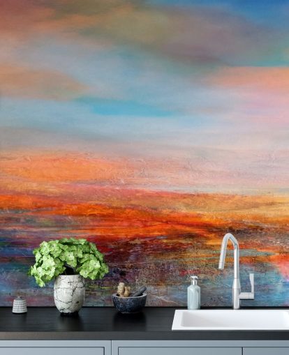 Colourful abstract painting of a sunset with reds, blues and yellows