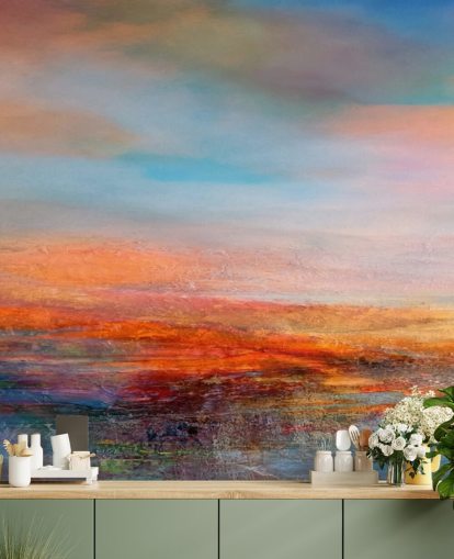 Colorful abstract painting of a sunset with reds, blues and yellows