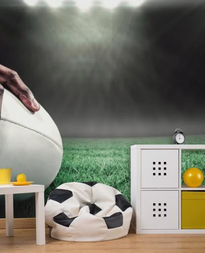 groen en zwart rugbybehang op maat genaamd Hand on Rugby Ball voor kinderkamers