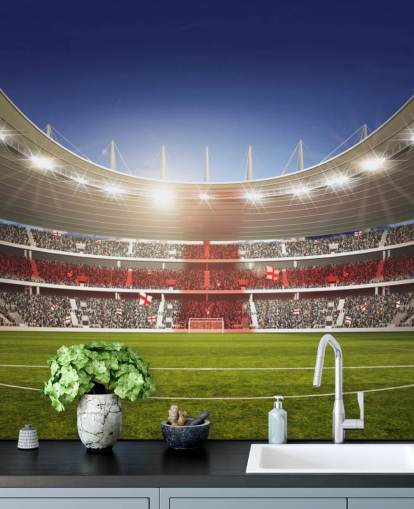 Estadio de fútbol con mural de la bandera de Inglaterra