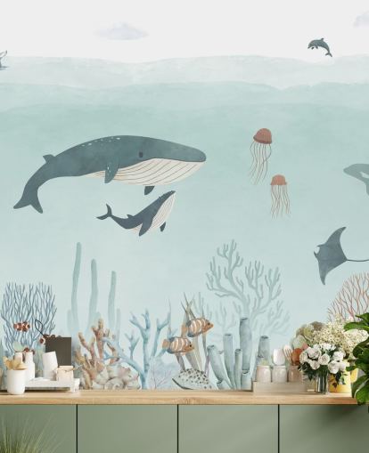 Lindo mural de vida marina con ballenas en azul