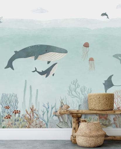 Lindo mural de vida marina con ballenas en azul