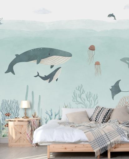 Lindo mural de vida marina con ballenas en azul