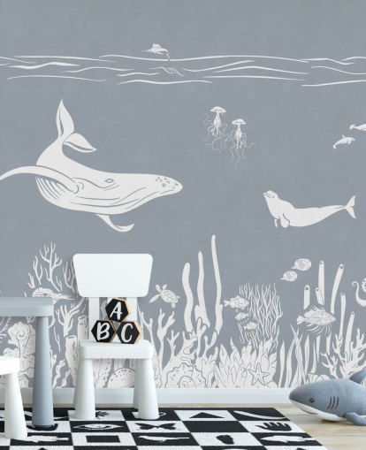 Papier peint pour enfants sur l'océan avec des baleines en bleu